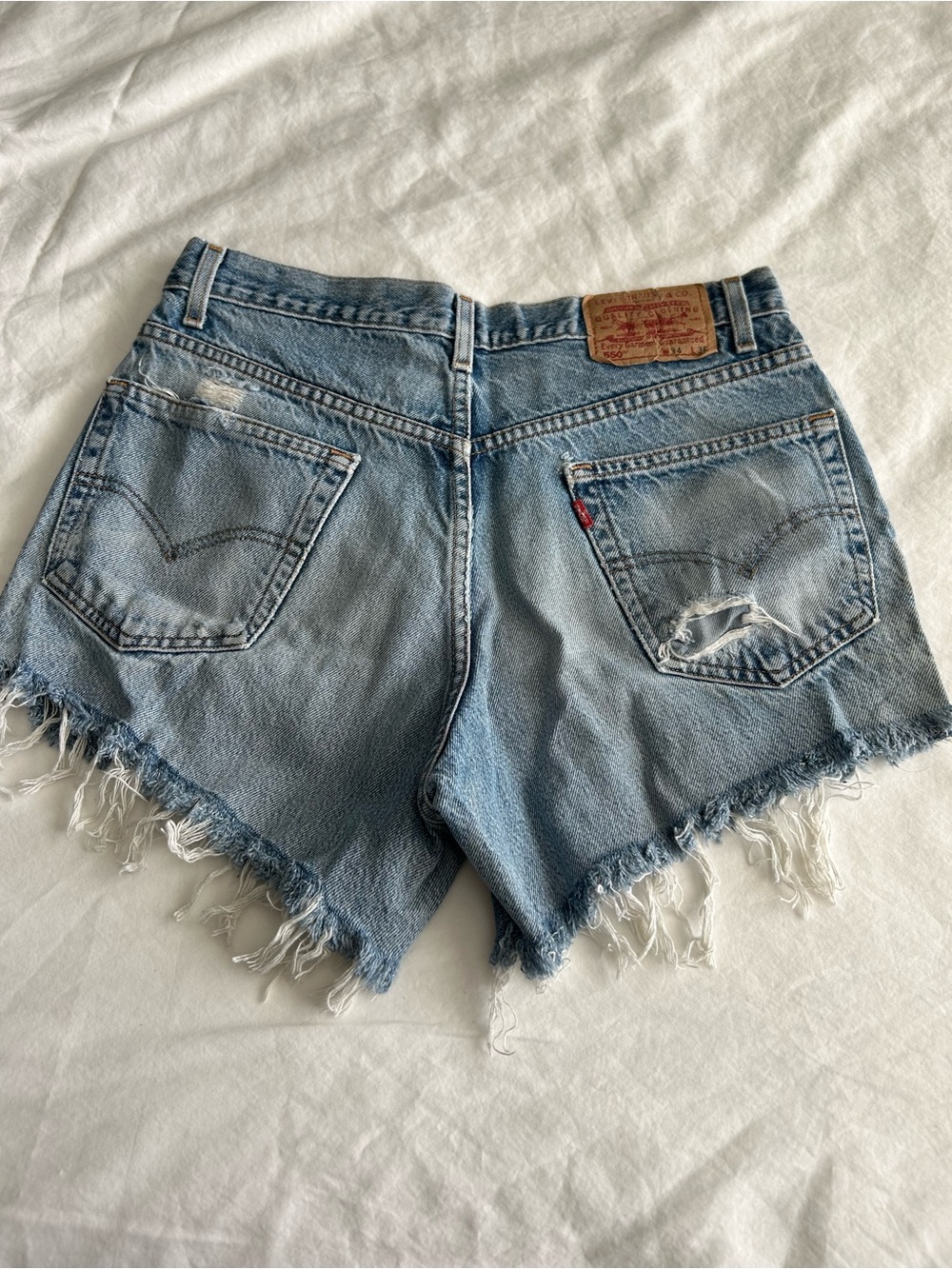 Levi's 550s Light Wash Distressed Denim Cutoff Shorts - Picture 8 of 15